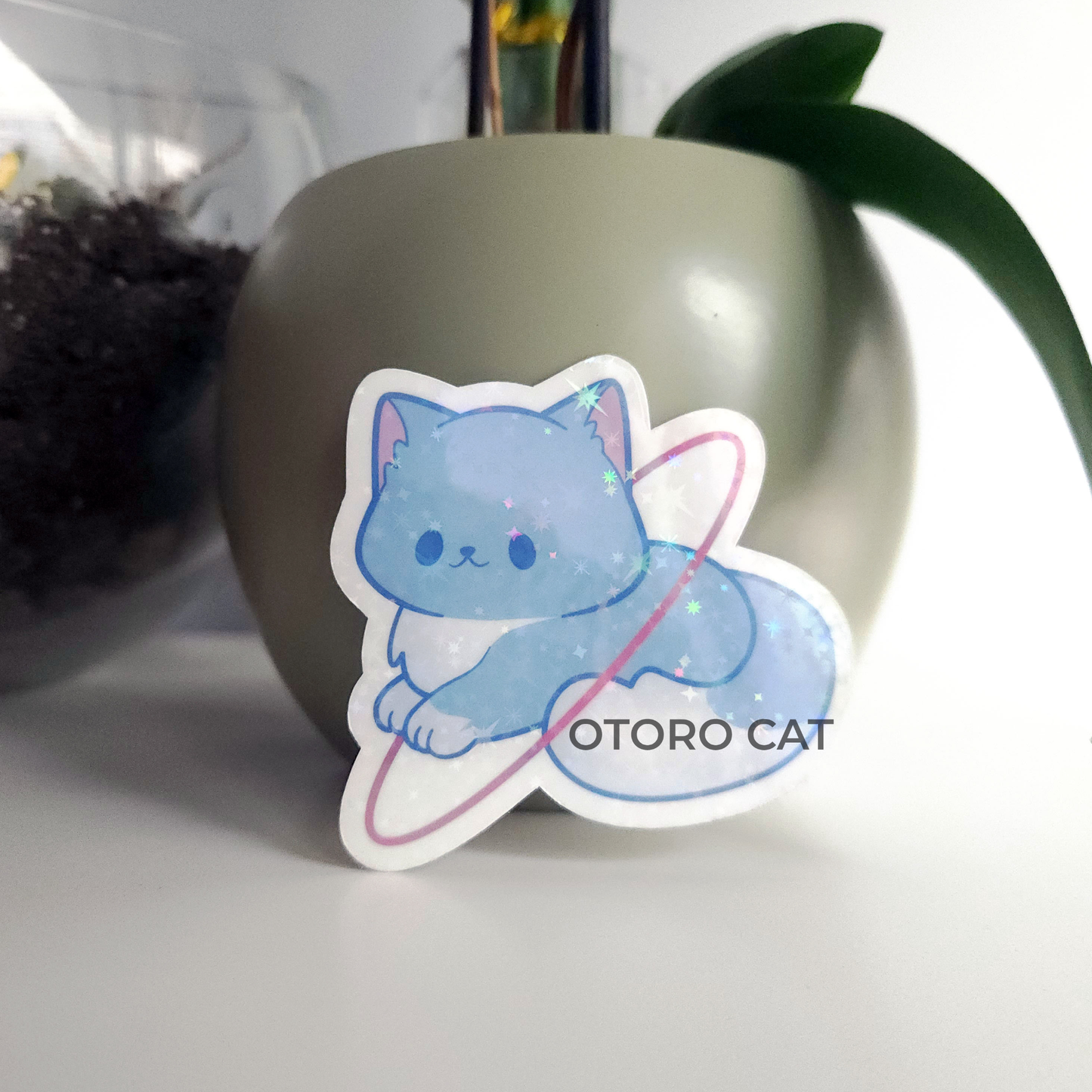Galactic Feline Elegance: Holographic Blue Cosmo Planet Cat Holographic Star Sticker