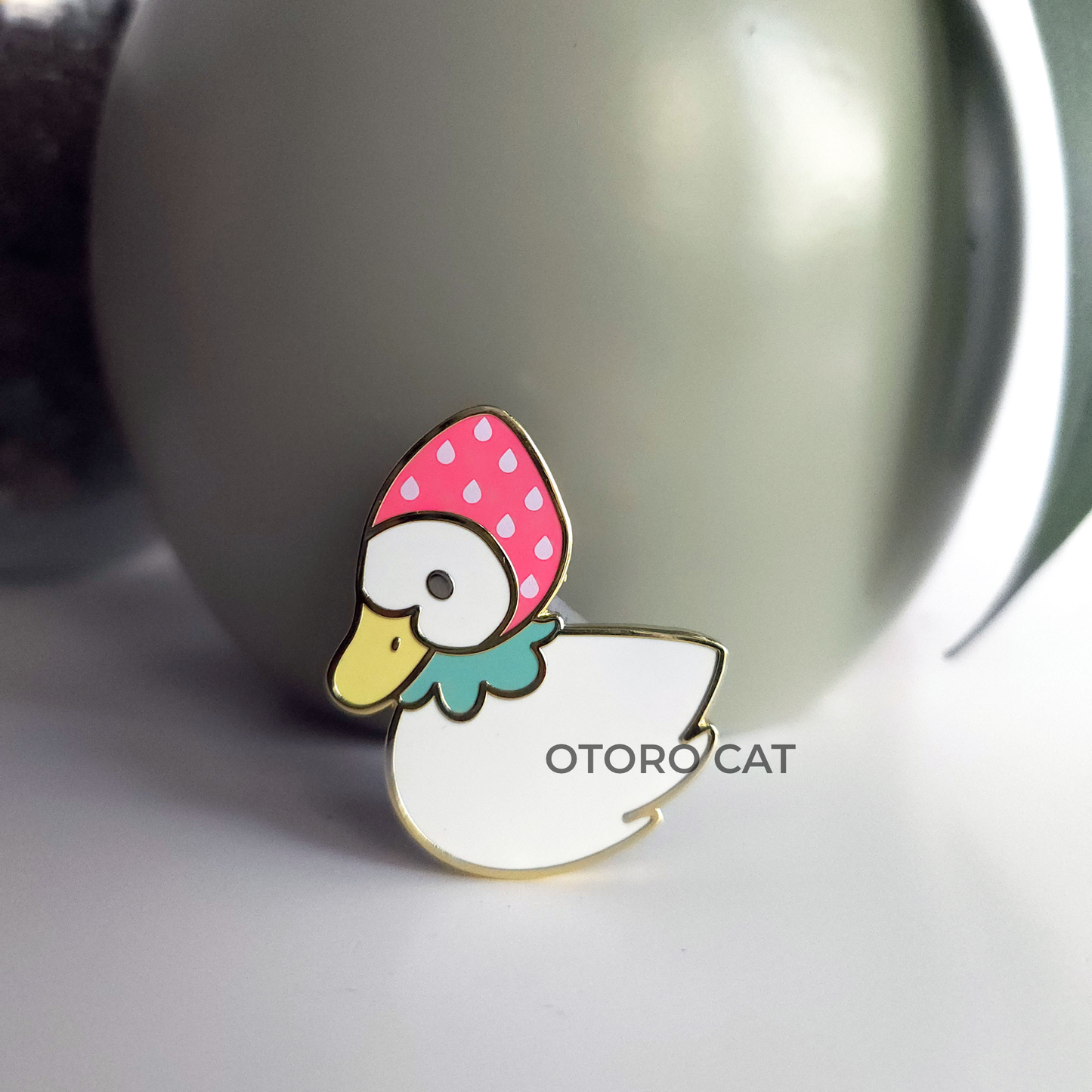 Quirky Duck in Strawberry Hat Enamel Pin - Adorable Fashion with Berry Charm